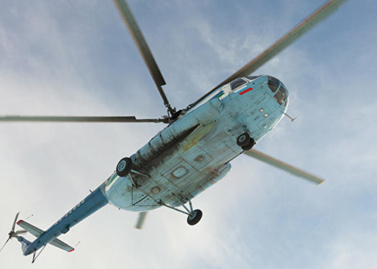 Rusiyada təyyarə qəza enişi etdi: Mi-8 hadisə yerinə uçdu